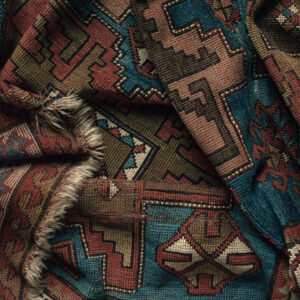 close up of a tapestry with Native American pattern