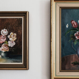 two oil paintings framed.